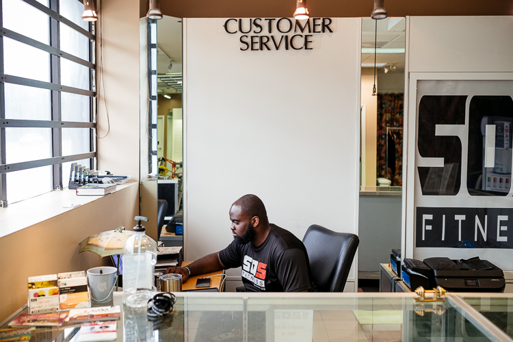 Bear Sanusi at SOS Fitness front desk