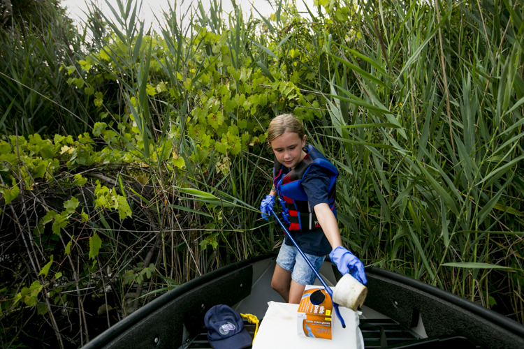 Jessica Speiss cleans up garbage