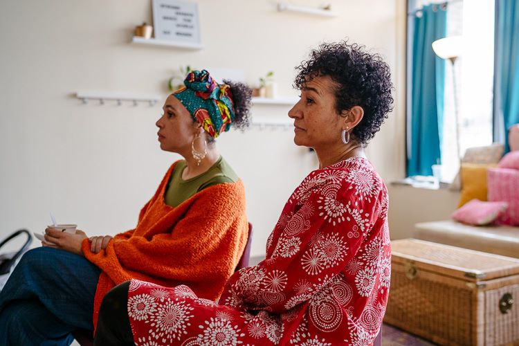 Jahmanna and Heather of DPMC listen to particpants at a recent workshop.