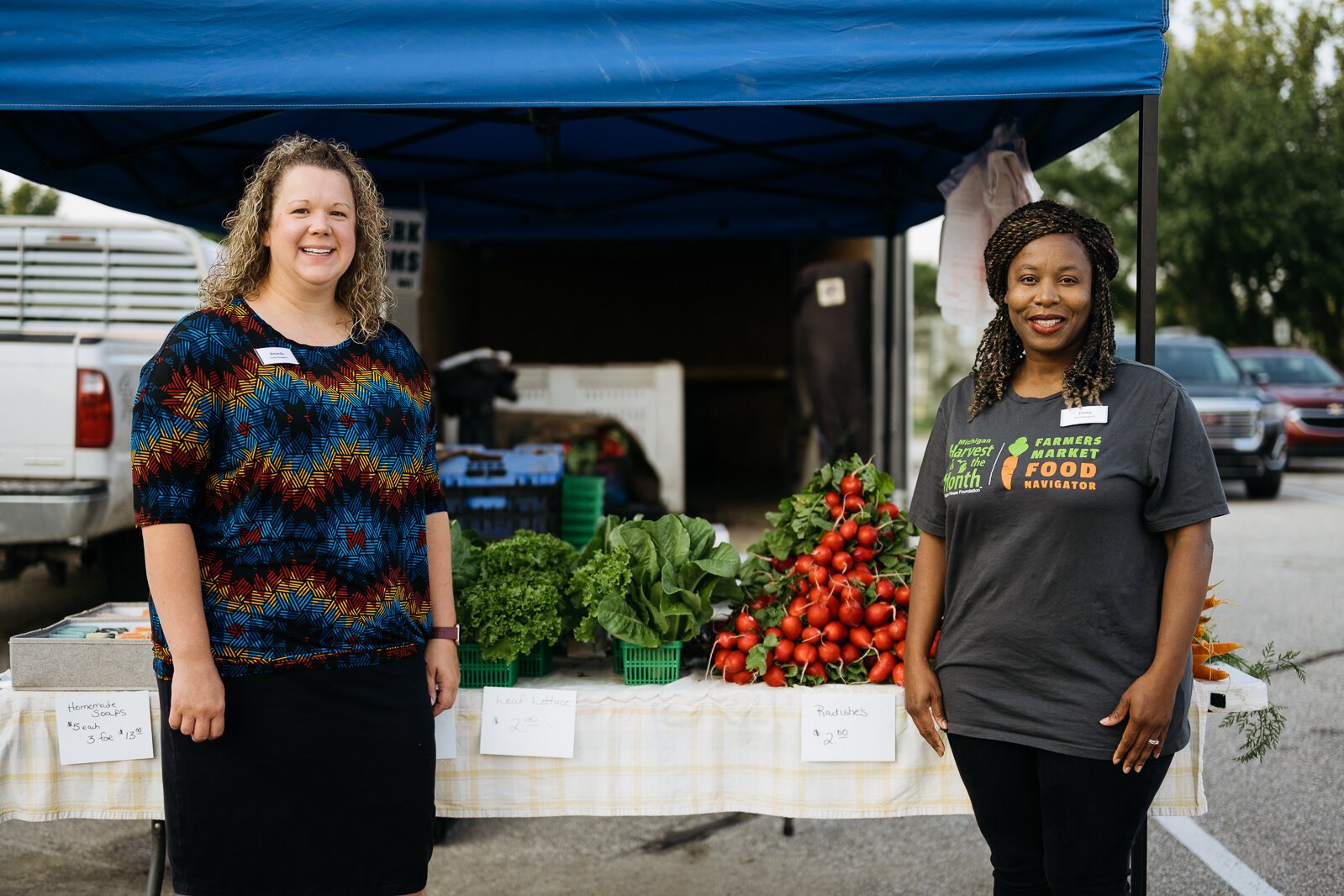 HFHS Farmers Market Food Navigators Amanda Krieg and Emma Shepherd at the Mt. Clemens Farmers Market.