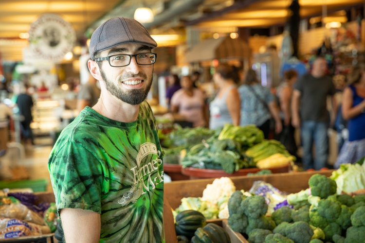 Flint Farmers Market vendor Clinton Peck, who prepares bags of produce for prescription holders.