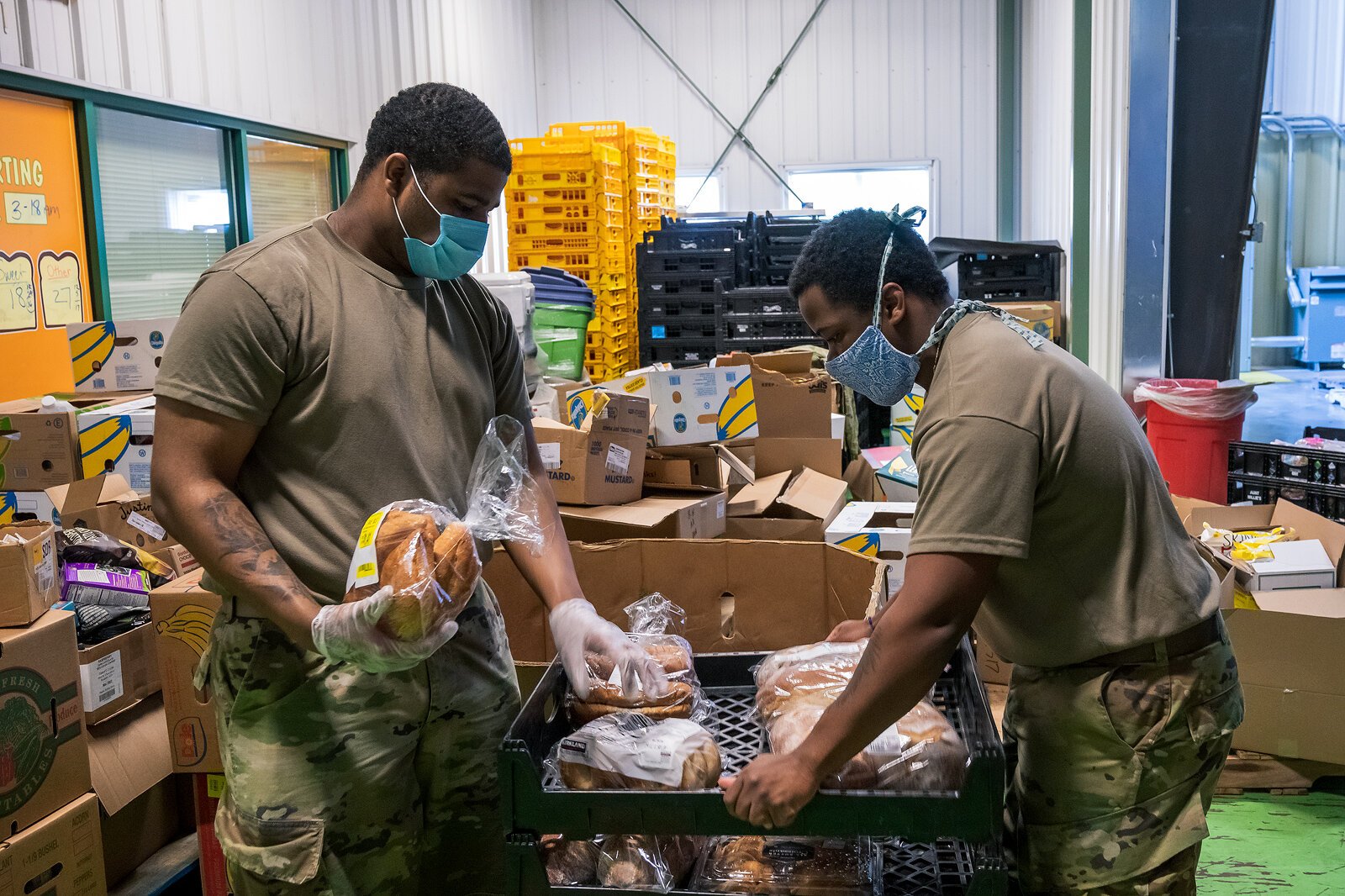 Michigan National Guard members volunteer at Food Gatherers.