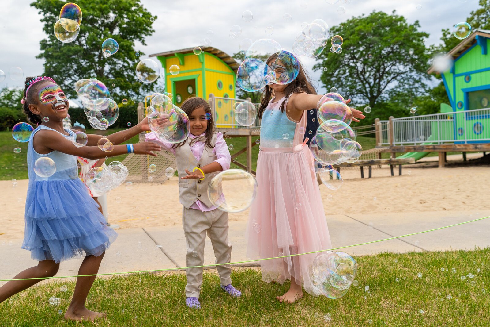 Kids play on the Detroit Riverfront.