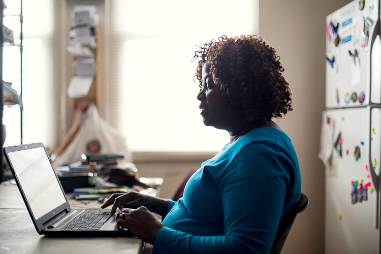 Norma Heath in her kitchen, where kids come to use her laptop. 