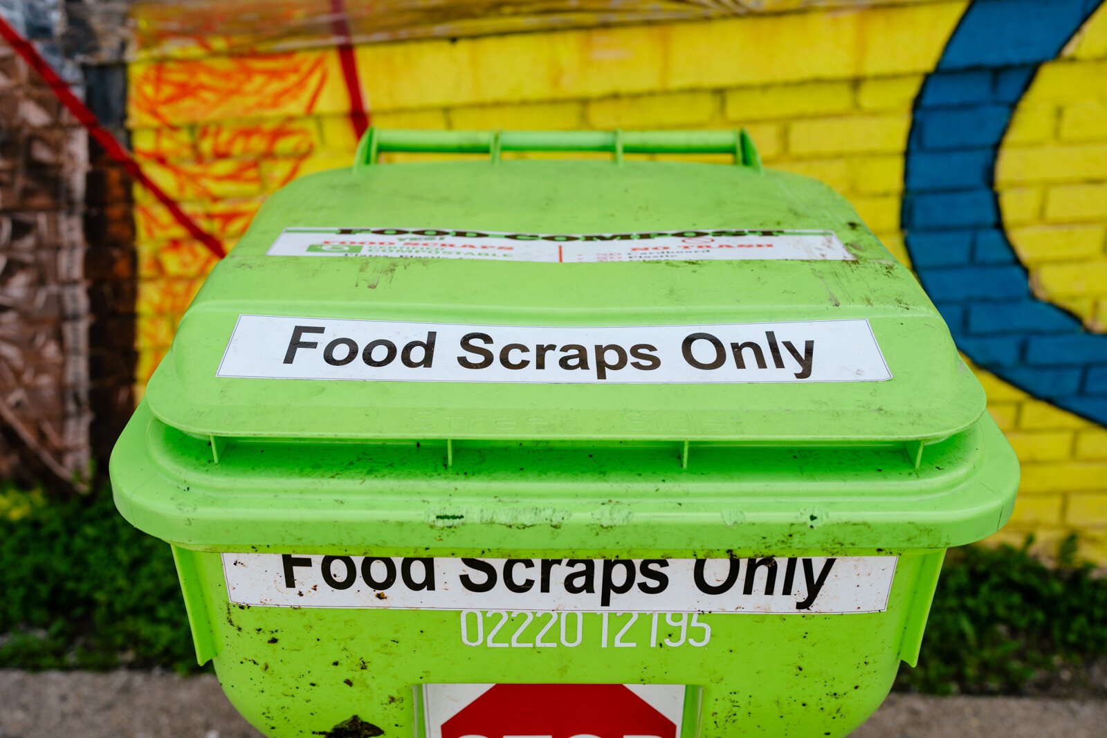 Sweet Potato Sensations' green compost bin outside their Old Redford location.