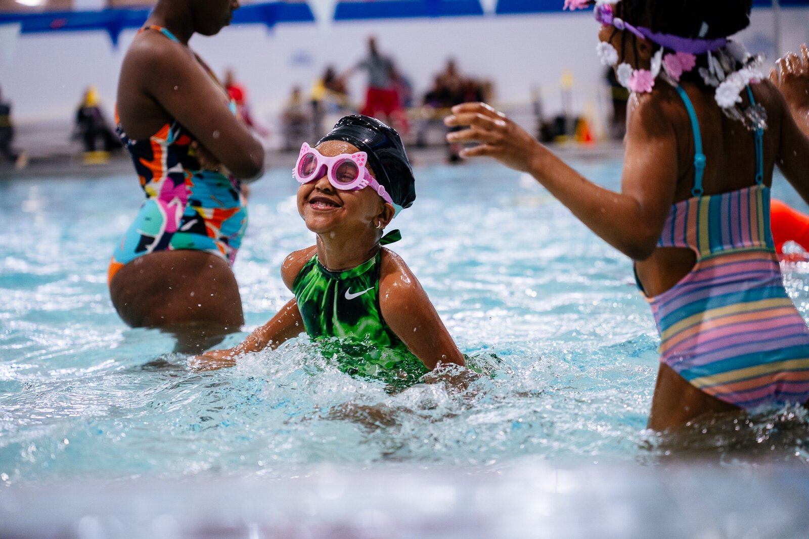 Kids participate in a water safety class at Adams Butzel Complex in Detroit.