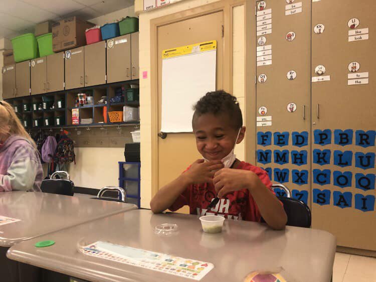 A student participates in a Pick a better snack™ session presented by the Battle Creek Family YMCA.