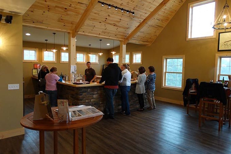 Customers taste the wine at Petoskey Farms Vineyard & Winery