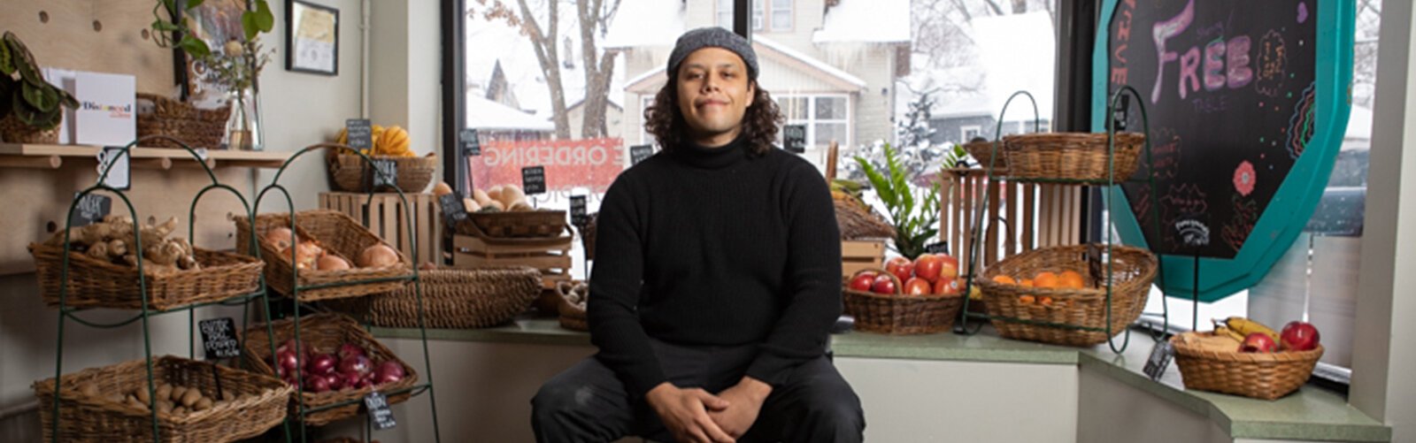 Anishinaabe chef and entrepreneur Camren Stott at South East market in Grand Rapids.