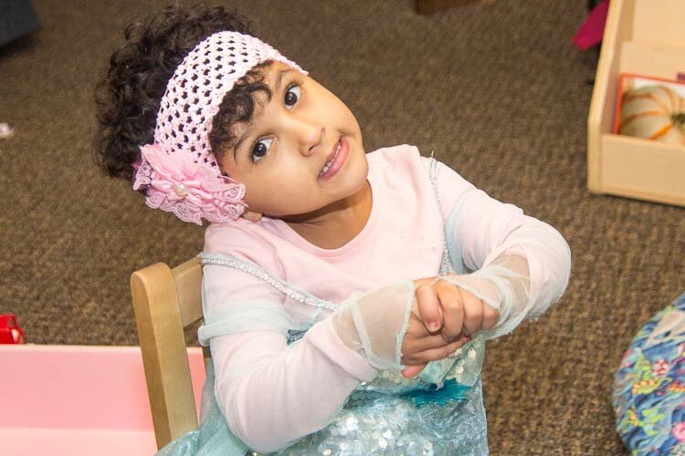 A child plays at the Kalamazoo Drop-In Child Care Center.