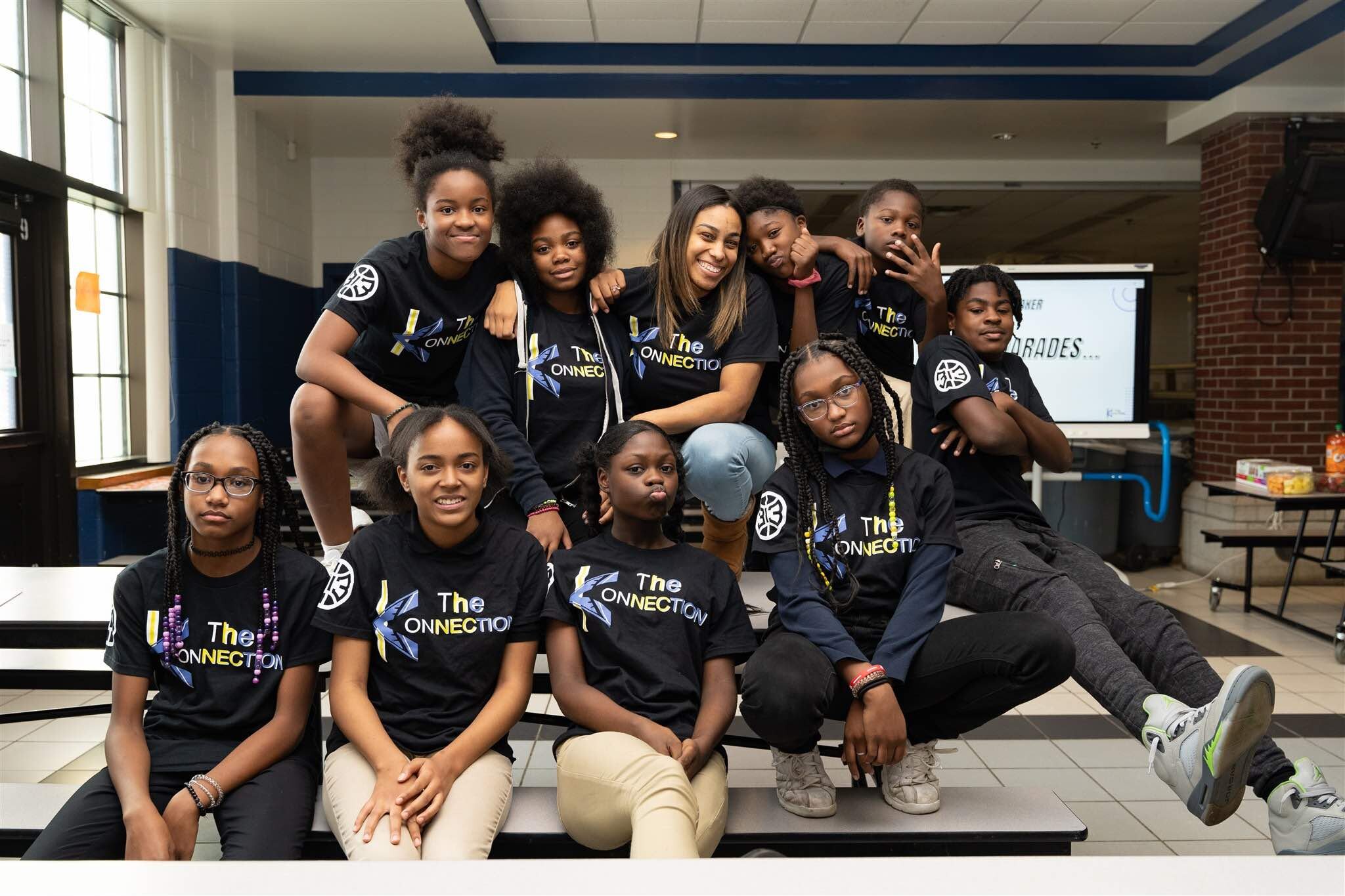 The Konnection CEO Sharnese Marshall (top row center) with Konnection Klub members from Durfee Elementary-Middle School