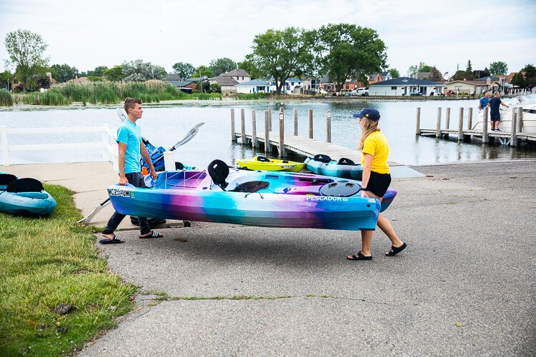 Taking a Simple Adventures kayak out on the water.