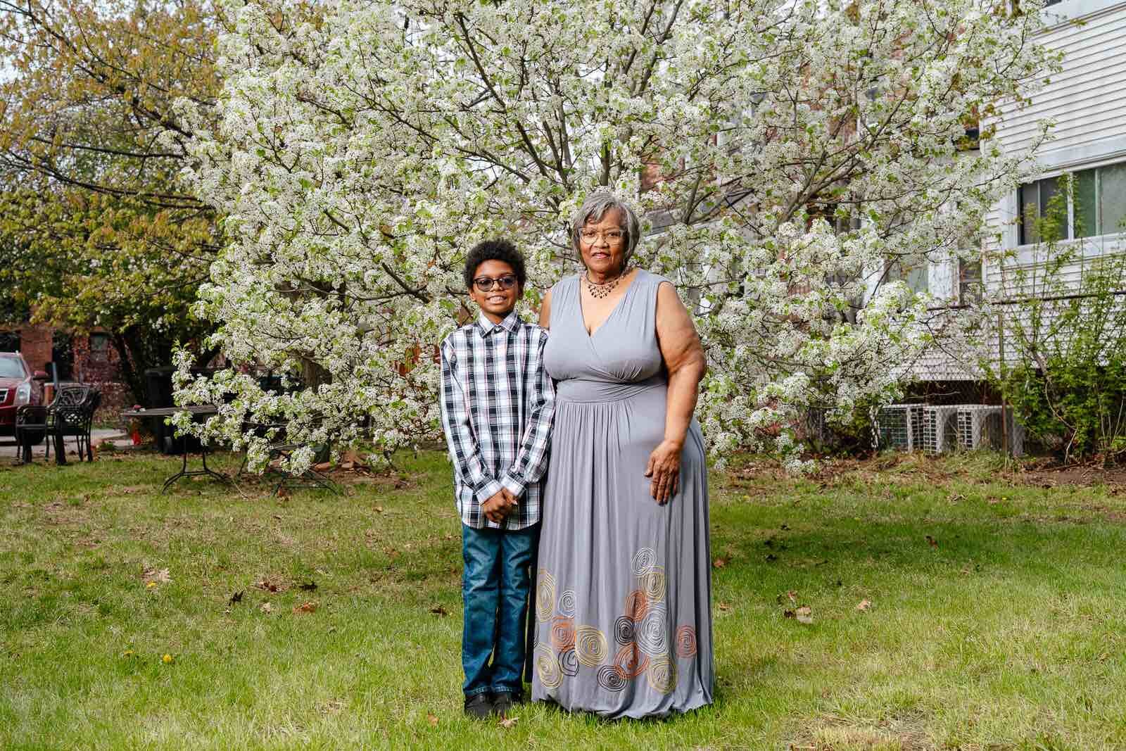 Delores Orr, with her grandson Blake, says that community land trusts are meant to build communities for generations to thrive