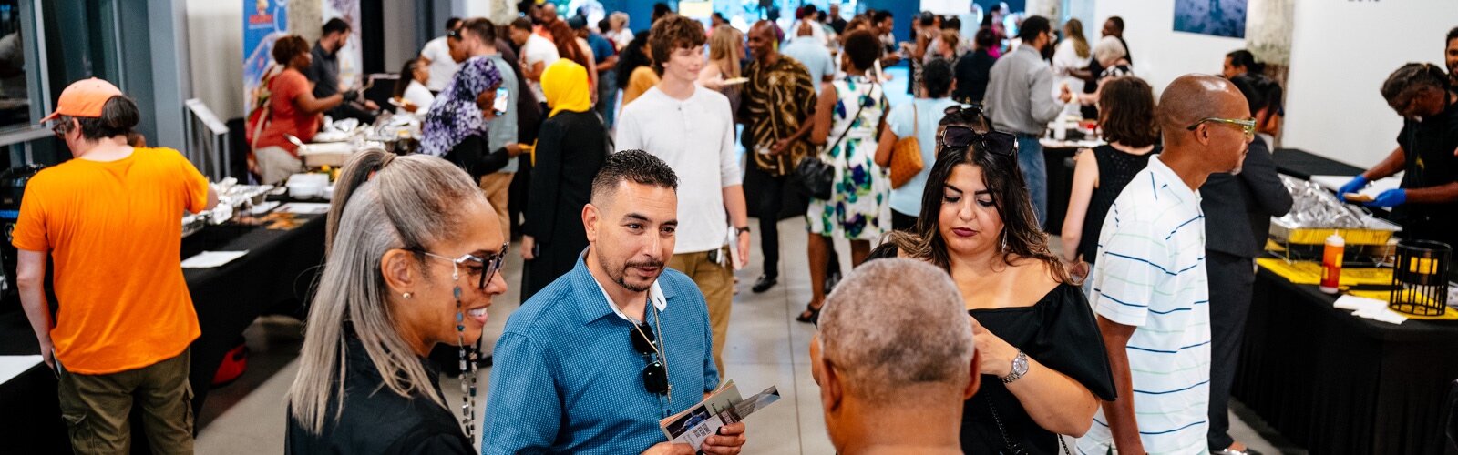 Attendees learn and mingle at the CDO VIP Expo event on July 29 at Newlab