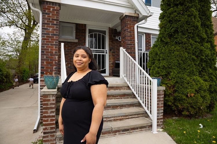 Briana Mason in front of her Morningside home